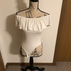 White ruffle body suit